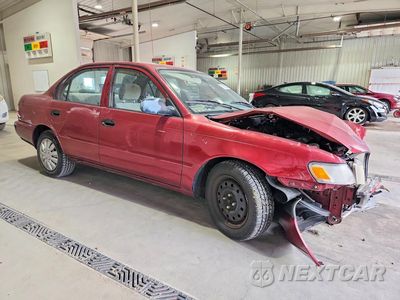 Czwarte zdjęcie samochodu z boku: 1997 TOYOTA COROLLA BASE VIN:2T1BA02E6VC165160 - miniatura