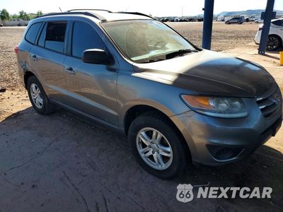 Czwarte zdjęcie samochodu z boku: 2012 HYUNDAI SANTA FE GLS VIN:5XYZGDAB6CG122449 - miniatura