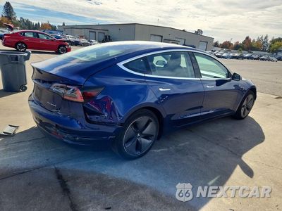 Trzecie zdjęcie samochodu z tyłu: 2018 TESLA MODEL 3 VIN:5YJ3E1EB2JF146496 - miniatura