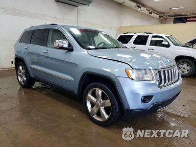Czwarte zdjęcie samochodu z boku: 2013 JEEP GRAND CHEROKEE LIMITED VIN:1C4RJFBG9DC583335 - miniatura