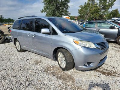 Czwarte zdjęcie samochodu z boku: 2014 TOYOTA SIENNA XLE 7-PASSENGER VIN:5TDDK3DC3ES083462 - miniatura