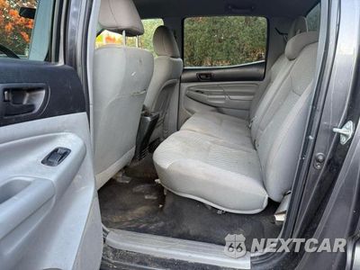 Zdjęcie 12 z 14 samochodu: 2015 TOYOTA TACOMA V6 VIN:3TMLU4EN3FM199466 - miniatura