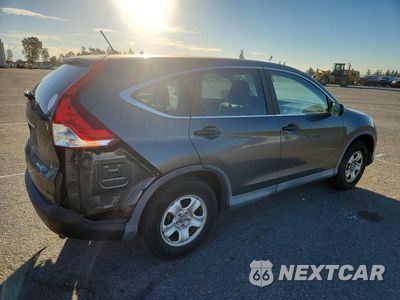 Trzecie zdjęcie samochodu z tyłu: 2012 HONDA CR-V LX VIN:2HKRM3H35CH502490 - miniatura