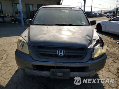 Piąte zdjęcie samochodu w środku: 2003 HONDA PILOT LX VIN:2HKYF181X3H586525 - miniatura