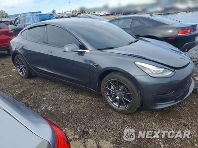 Czwarte zdjęcie samochodu z boku: 2019 TESLA MODEL 3 VIN:5YJ3E1EA2KF396281 - miniatura
