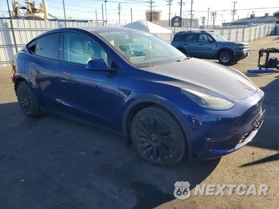 Czwarte zdjęcie samochodu z boku: 2023 TESLA MODEL Y VIN:7SAYGDED1PF977552 - miniatura