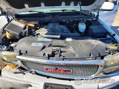 Zdjęcie 12 z 13 samochodu: 2006 GMC YUKON XL DENALI VIN:1GKFK66U46J106573 - miniatura