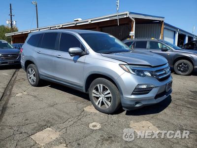 Czwarte zdjęcie samochodu z boku: 2017 HONDA PILOT EXL VIN:5FNYF6H54HB002464 - miniatura