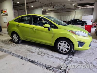 Czwarte zdjęcie samochodu z boku: 2012 FORD FIESTA SE VIN:3FADP4BJ9CM155776 - miniatura