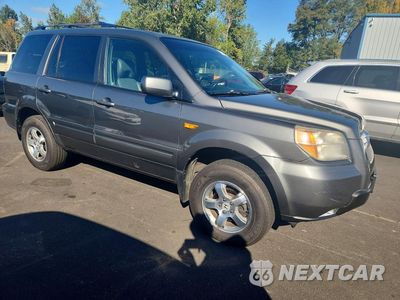 Czwarte zdjęcie samochodu z boku: 2007 HONDA PILOT EXL VIN:5FNYF18737B031215 - miniatura