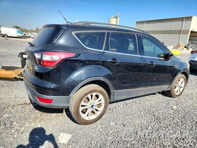 Trzecie zdjęcie samochodu z tyłu: 2017 FORD ESCAPE SE VIN:1FMCU0GD2HUD38672 - miniatura
