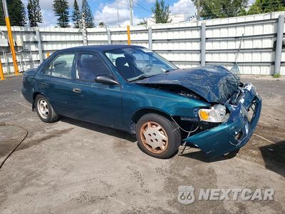 Czwarte zdjęcie samochodu z boku: 2002 TOYOTA COROLLA CE VIN:1NXBR12E82Z634175 - miniatura