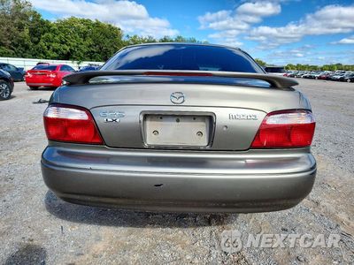 Zdjęcie 6 z 13 samochodu: 2000 MAZDA 626 ES VIN:1YVGF22C3Y5169387 - miniatura