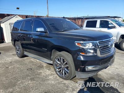 Czwarte zdjęcie samochodu z boku: 2015 CHEVROLET TAHOE C1500 LTZ VIN:1GNSCCKC2FR723952 - miniatura