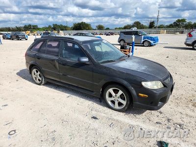 Czwarte zdjęcie samochodu z boku: 2002 MAZDA PROTEGE PR5 VIN:JM1BJ245221478148 - miniatura