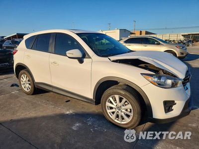Czwarte zdjęcie samochodu z boku: 2016 MAZDA CX-5 TOURING VIN:JM3KE2CY6G0871476 - miniatura