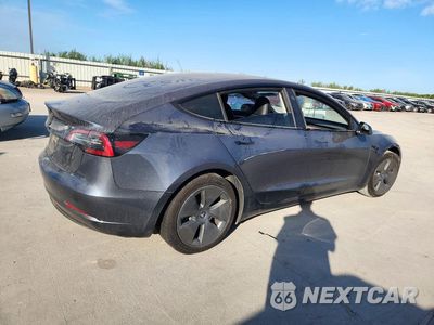 Trzecie zdjęcie samochodu z tyłu: 2023 TESLA MODEL 3 VIN:5YJ3E1EA2PF706534 - miniatura