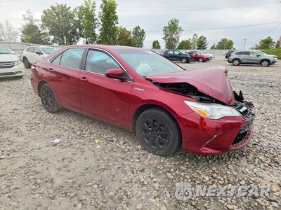 Czwarte zdjęcie samochodu z boku: 2015 TOYOTA CAMRY HYBRID LE VIN:4T1BD1FKXFU151176 - miniatura
