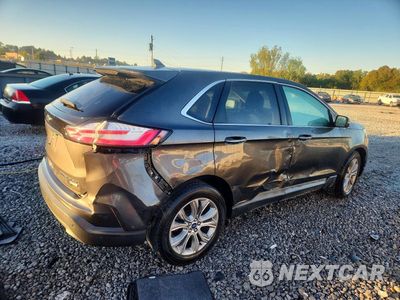 Trzecie zdjęcie samochodu z tyłu: 2019 FORD EDGE TITANIUM VIN:2FMPK3K97KBC23087 - miniatura