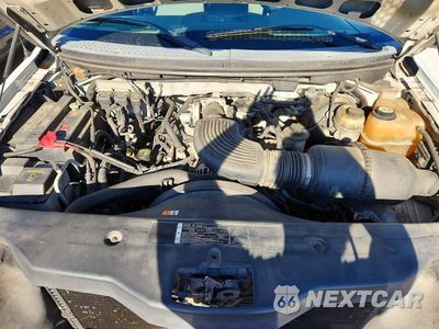 Zdjęcie 11 z 12 samochodu: 2005 FORD F150 VIN:1FTRX14W05FA58203 - miniatura
