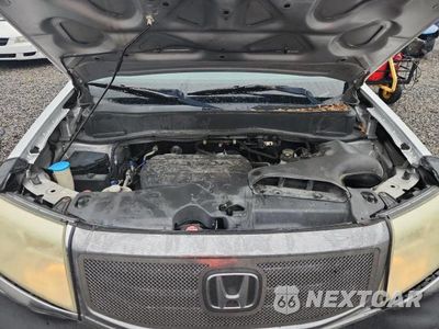 Zdjęcie 12 z 13 samochodu: 2012 HONDA PILOT EXLN VIN:5FNYF3H73CB017191 - miniatura