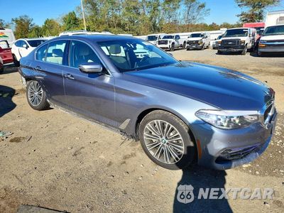 Czwarte zdjęcie samochodu z boku: 2018 BMW 530 XI VIN:WBAJA7C5XJWC75004 - miniatura
