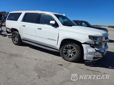 Czwarte zdjęcie samochodu z boku: 2018 CHEVROLET SUBURBAN K1500 LT VIN:1GNSKHKC1JR370015 - miniatura