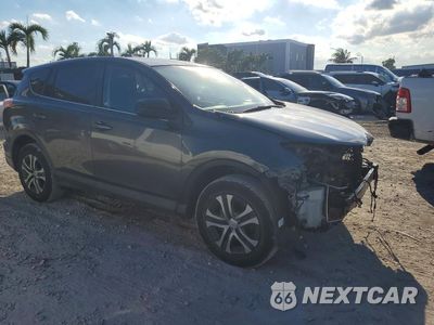 Czwarte zdjęcie samochodu z boku: 2018 TOYOTA RAV4 LE VIN:2T3ZFREV7JW411570 - miniatura
