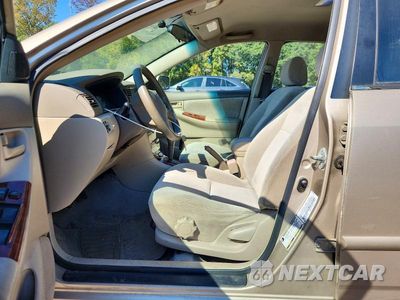 Zdjęcie 7 z 12 samochodu: 2004 TOYOTA COROLLA LE VIN:2T1BR32E44C309216 - miniatura