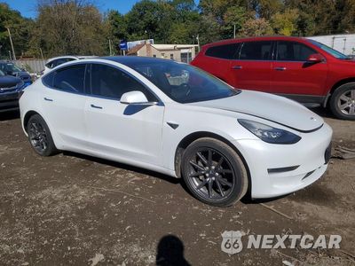 Czwarte zdjęcie samochodu z boku: 2019 TESLA MODEL 3 VIN:5YJ3E1EA3KF407613 - miniatura
