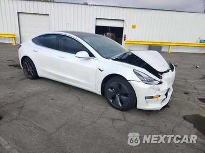 Czwarte zdjęcie samochodu z boku: 2020 TESLA MODEL 3 VIN:5YJ3E1EA4LF805849 - miniatura