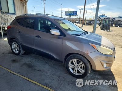 Czwarte zdjęcie samochodu z boku: 2013 HYUNDAI TUCSON GLS VIN:KM8JU3AC6DU685151 - miniatura