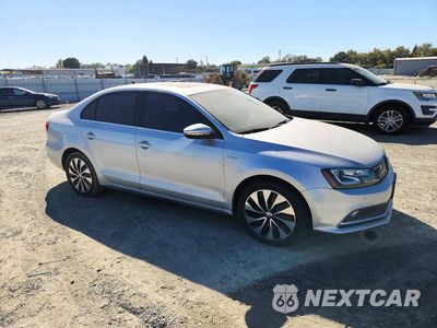 Czwarte zdjęcie samochodu z boku: 2015 VOLKSWAGEN JETTA HYBRID VIN:3VW637AJ0FM307589 - miniatura