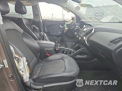 Zdjęcie 7 z 13 samochodu: 2011 HYUNDAI TUCSON GLS VIN:KM8JUCAC0BU257900 - miniatura