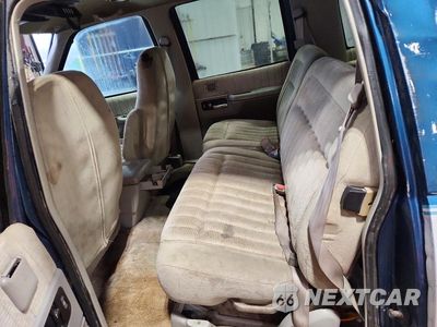 Zdjęcie 10 z 12 samochodu: 1994 GMC SUBURBAN C1500 VIN:1GKEC16K9RJ754098 - miniatura
