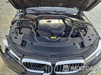 Zdjęcie 11 z 12 samochodu: 2017 BMW 740 XE VIN:WBA7J2C30HG497953 - miniatura