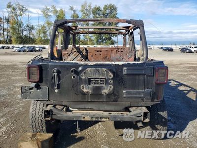 Zdjęcie 6 z 12 samochodu: 2012 JEEP WRANGLER UNLIMITED SAHARA VIN:1C4BJWEG2CL216384 - miniatura