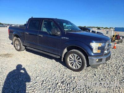 Czwarte zdjęcie samochodu z boku: 2015 FORD F150 XLT VIN:1FTEW1EFXFFC01840 - miniatura