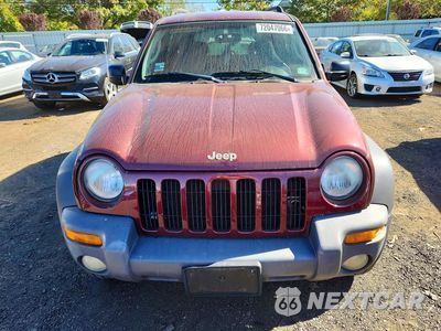 Piąte zdjęcie samochodu w środku: 2003 JEEP LIBERTY SPORT VIN:1J4GL48K03W607336 - miniatura