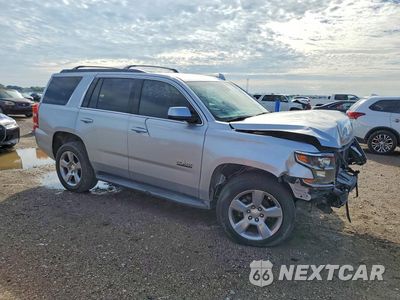 Czwarte zdjęcie samochodu z boku: 2016 CHEVROLET TAHOE C1500 LT VIN:1GNSCBKC2GR316936 - miniatura