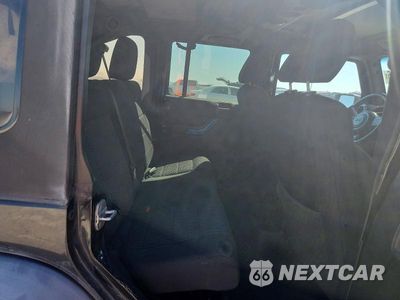 Zdjęcie 10 z 12 samochodu: 2011 JEEP WRANGLER UNLIMITED RUBICON VIN:1J4HA6H12BL630310 - miniatura