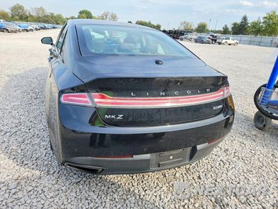Zdjęcie 6 z 12 samochodu: 2015 LINCOLN MKZ VIN:3LN6L2J91FR609922 - miniatura