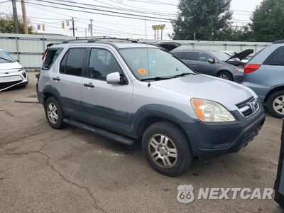 Czwarte zdjęcie samochodu z boku: 2004 HONDA CR-V EX VIN:SHSRD78824U258471 - miniatura
