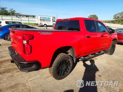 Trzecie zdjęcie samochodu z tyłu: 2022 CHEVROLET SILVERADO K1500 LT TRAIL BOSS VIN:3GCUDFED6NG590292 - miniatura