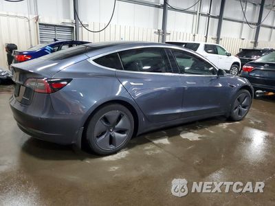 Trzecie zdjęcie samochodu z tyłu: 2020 TESLA MODEL 3 VIN:5YJ3E1EB7LF601040 - miniatura