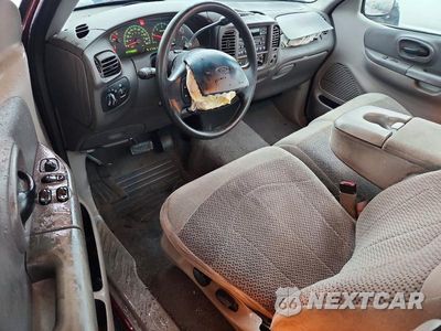 Zdjęcie 8 z 12 samochodu: 1999 FORD F150 XLT VIN:1FTRF17W7XNA06087 - miniatura