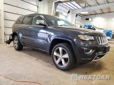 Czwarte zdjęcie samochodu z boku: 2014 JEEP GRAND CHEROKEE OVERLAND VIN:1C4RJFCG5EC219140 - miniatura