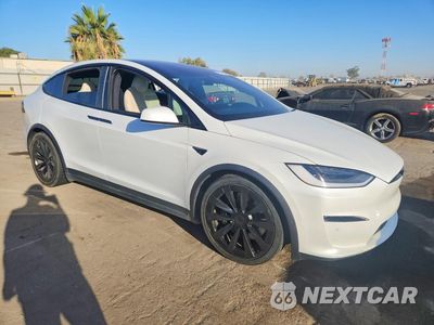 Czwarte zdjęcie samochodu z boku: 2022 TESLA MODEL X VIN:7SAXCAE50NF350238 - miniatura