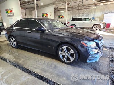 Czwarte zdjęcie samochodu z boku: 2017 MERCEDES-BENZ E 300 VIN:WDDZF4JB9HA213411 - miniatura