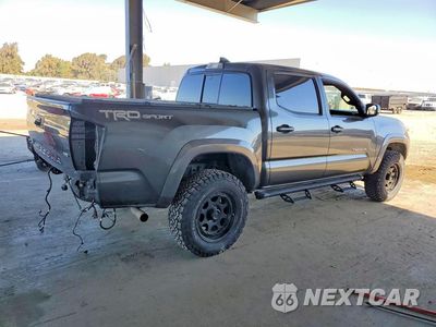 Trzecie zdjęcie samochodu z tyłu: 2016 TOYOTA TACOMA TRD SPORT VIN:3TMAZ5CN6GM018041 - miniatura